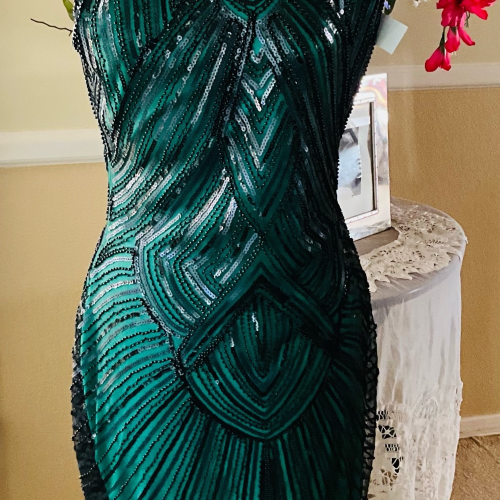 Black beaded dress over green with tassels on bottom - Picture 3 of 8